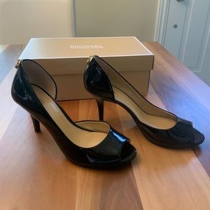 Michael Kors patent leather peep toe pump.